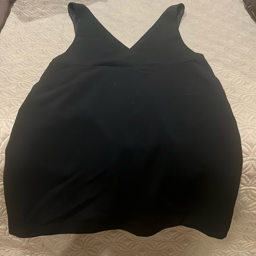 Black V neck dress with pockets. New with tag